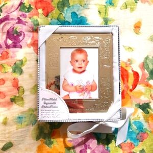 NWT Silver plated engravable picture frame. One size.